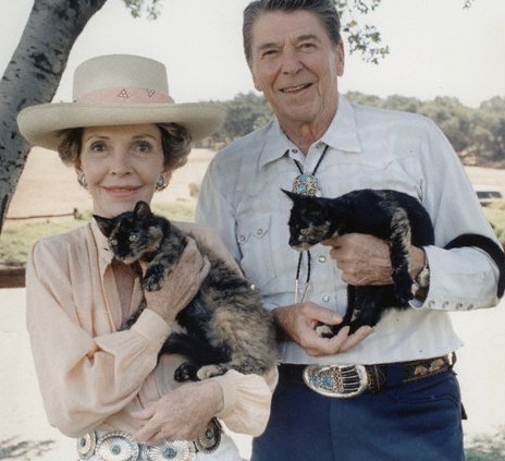 Ronald and Nancy Reagan with their cats, Cleo and Sara. 