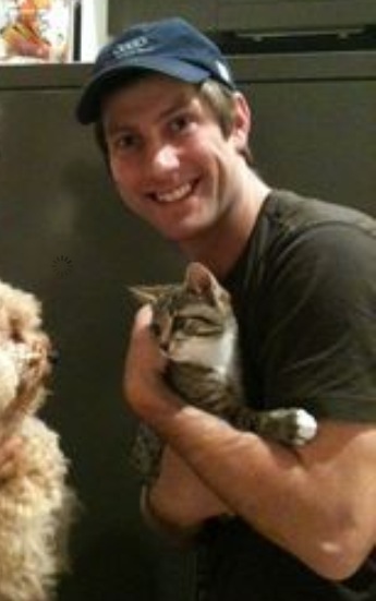 PodTracker Founder Sebastian Langton with his cat, Rango